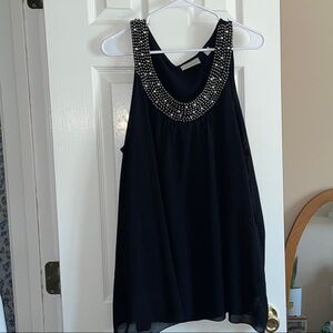 Plus Size Sleeveless Blouse with Embellished Neckline